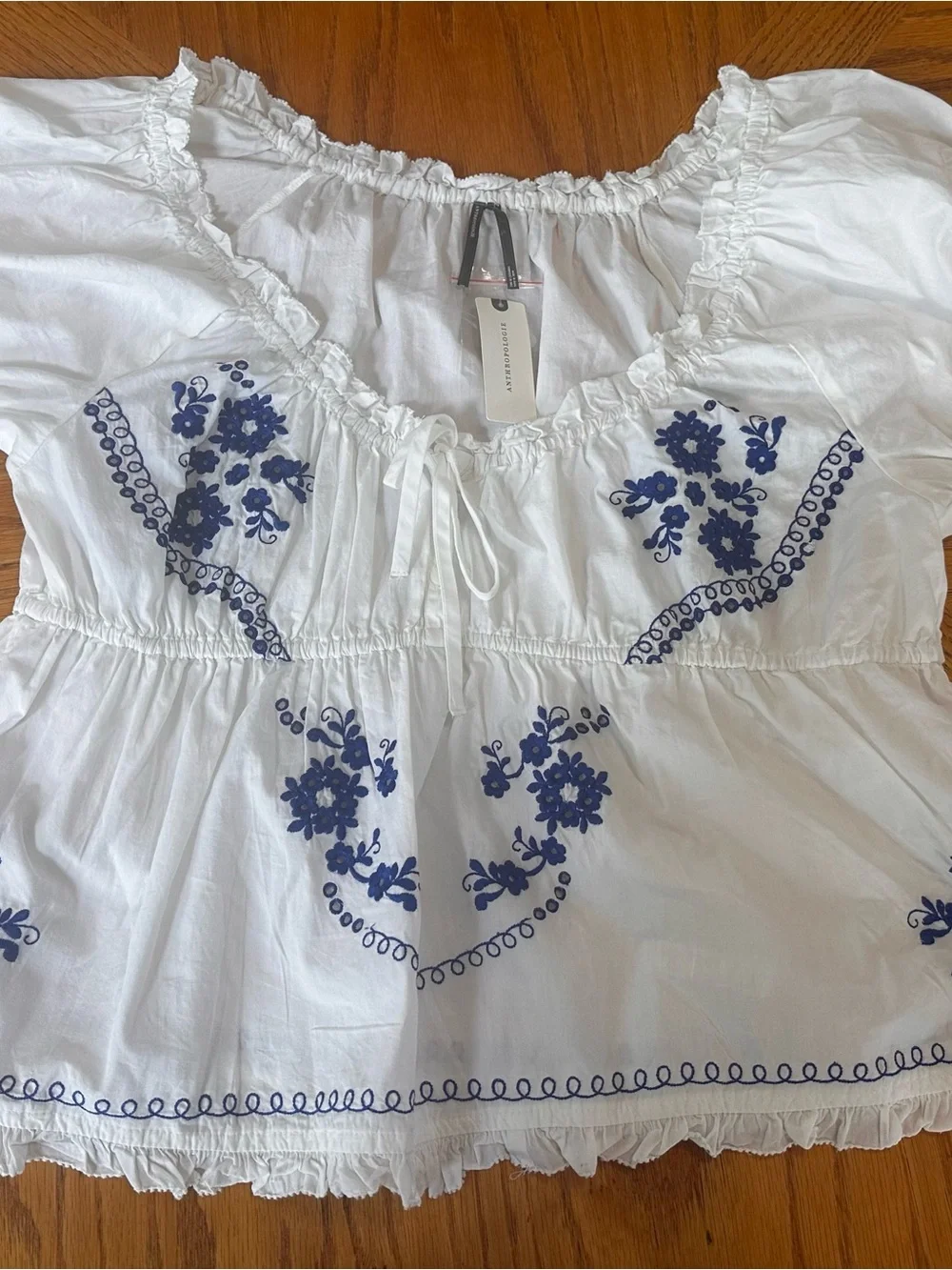 White Embroidered Peasant Top with Blue Floral Detailing